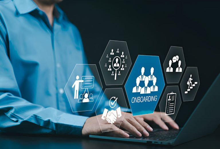 professional using a laptop with onboarding-related icons